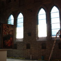 beschermende glasfolie plaatsen voor een Hans Memling in Museum Brugge door Media Noord Raamfolies uit Hoogstraten